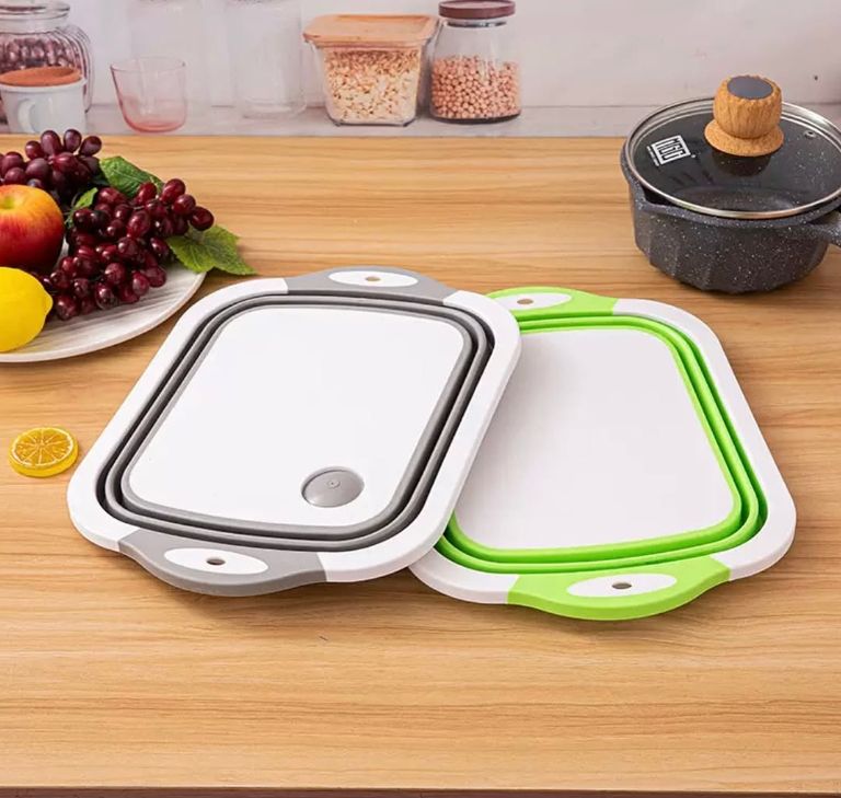 Multifunctional foldable cutting board, sink, and draining basket